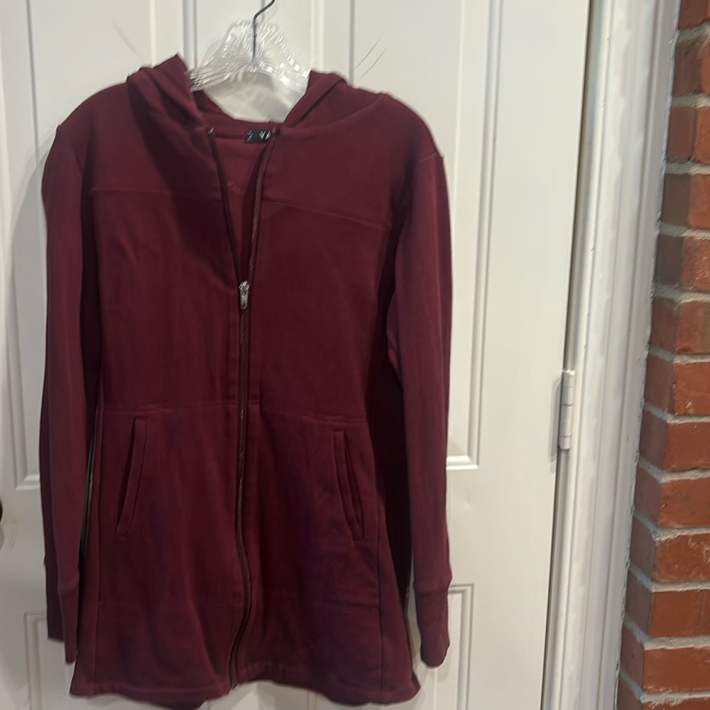Yaks full front zippered long fleece type jacket.  Fairly fitted and a great fit